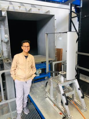 Yusril beside some equipment