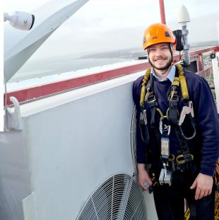 Andrew Russell in safety harness and hard hat