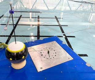 mechanical engineering research equipment laid out in front of the Flowave Ocean Research test tank