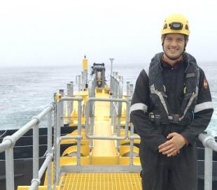 Jan Dillenburger-Keenan in full marine safety gear, aboard an offshore energy device at sea